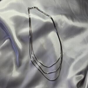 Signed D'Orlan 3 strand silvertone Graduated Chain